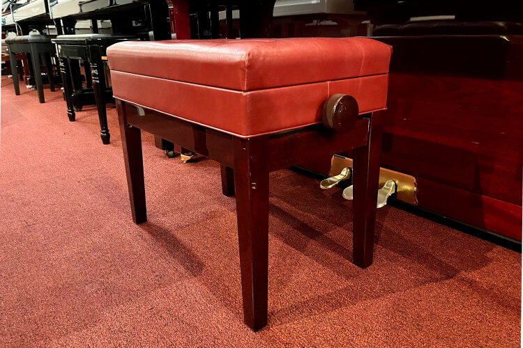 brown adjustable piano bench